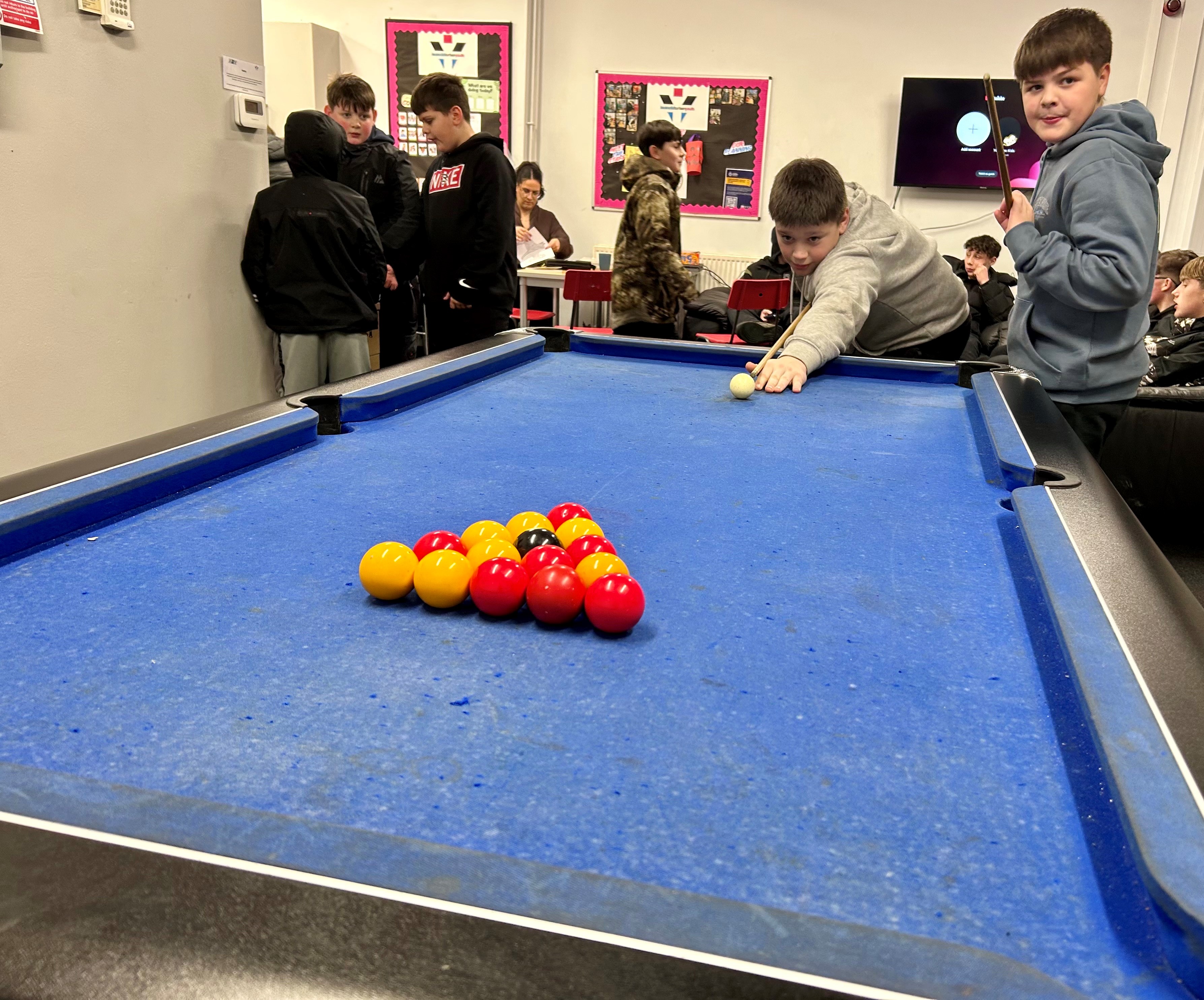 Children playing pool