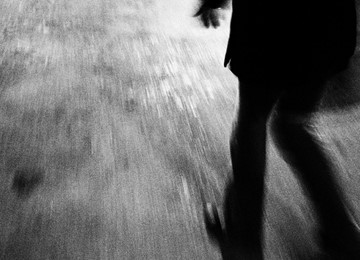 Black and white image of someone in silhouette