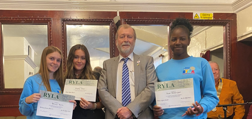 Jeff Cuthbert presenting certificates to members of Brynmawr youth organisations