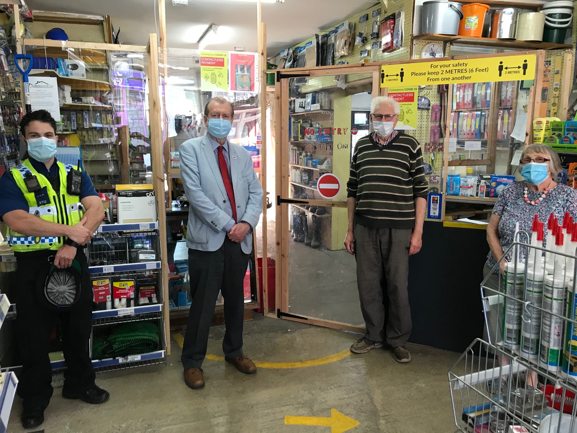 Jeff Cuthbert, a police officer and members of the public in Ystrad
