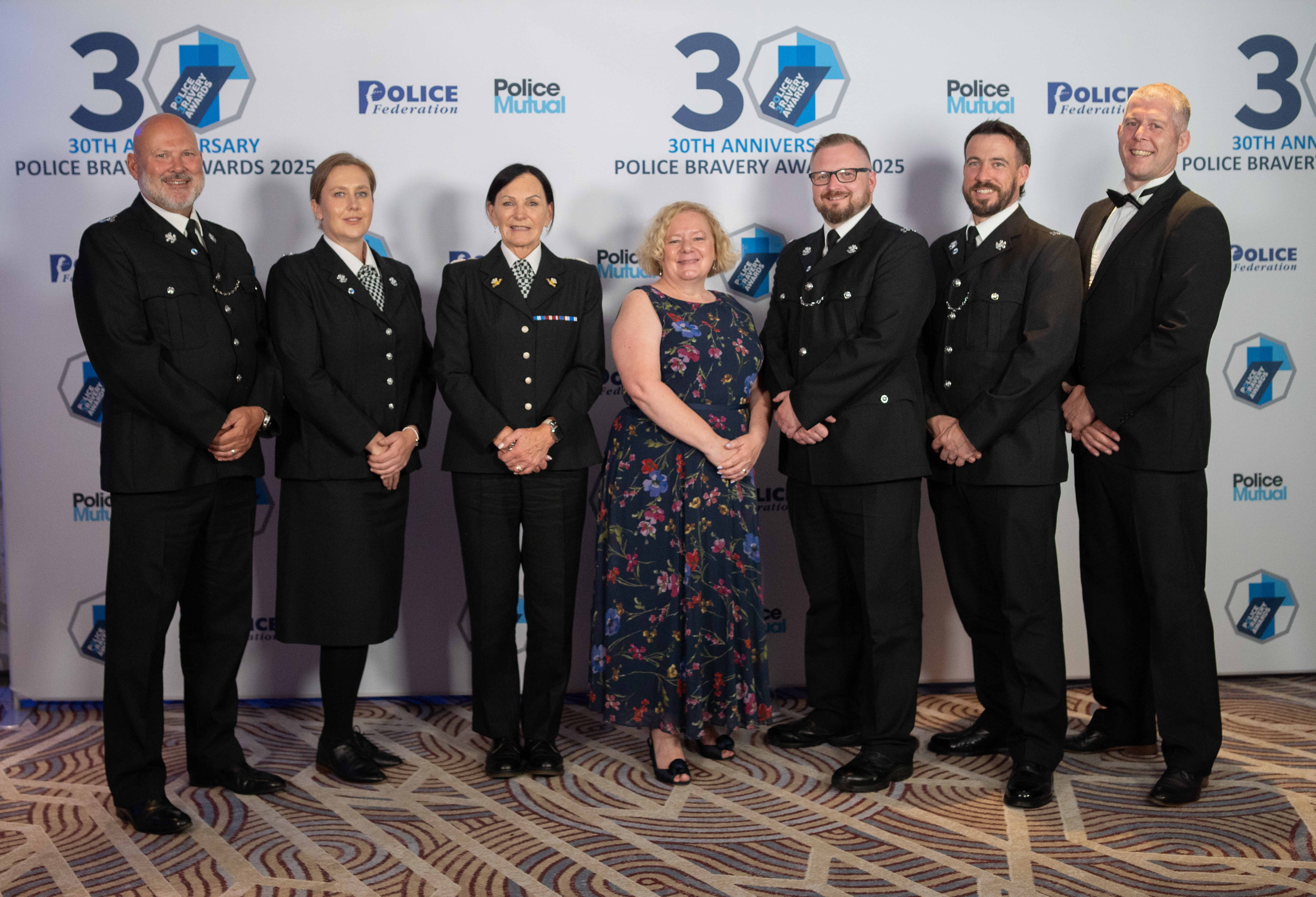 Jane Mudd with police officers