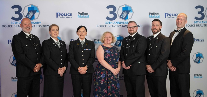 Jane Mudd with police officers