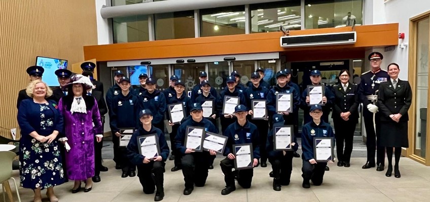 Police cadets holding certificates