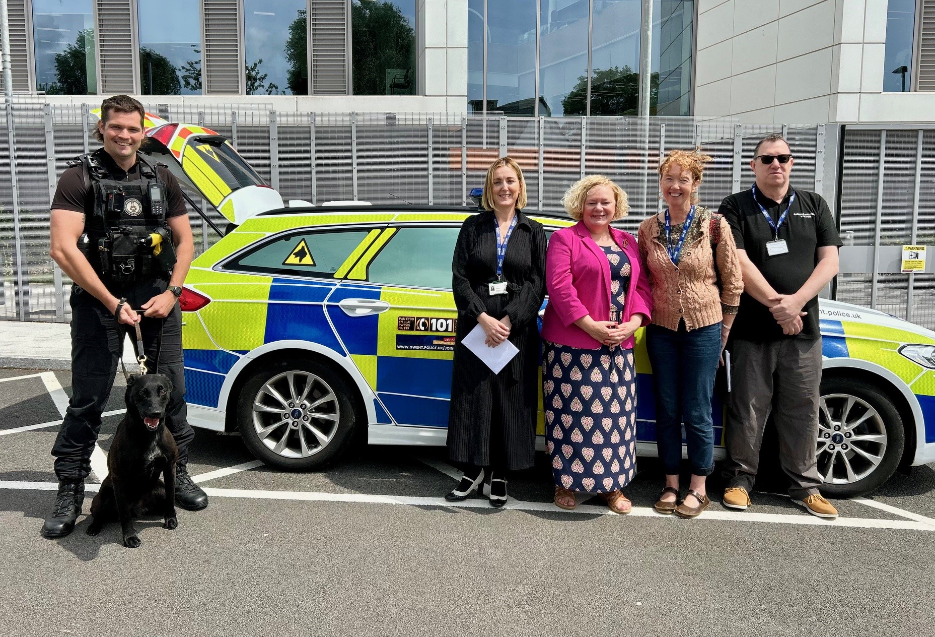 Jane Mudd with police dog handler and volunteers