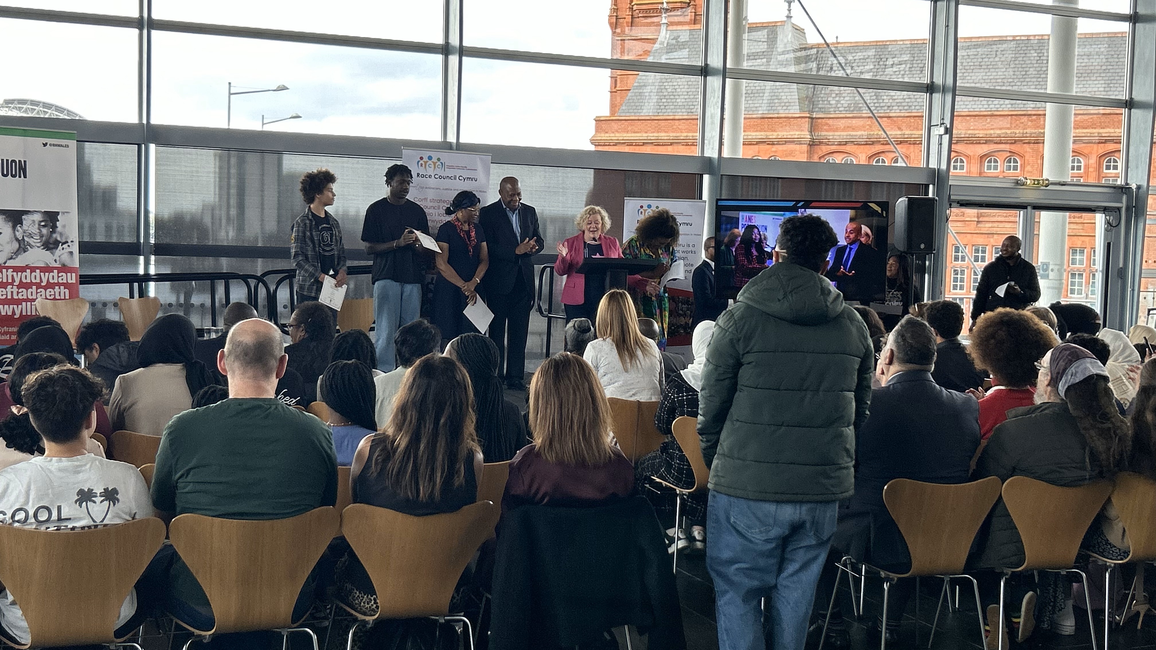 PCC Jane Mudd on stage in front of audience 