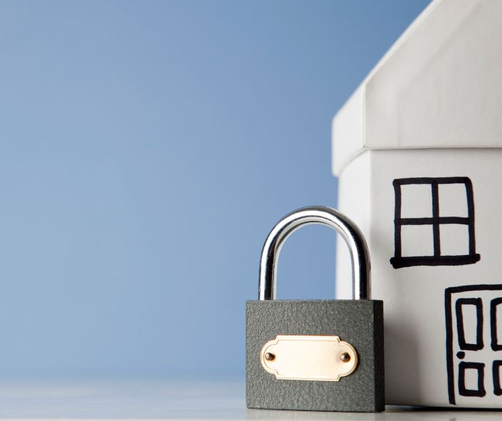 picture of padlock next to house