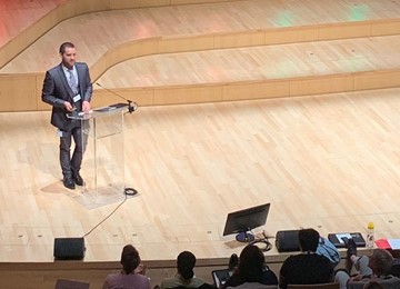 Nick delivering a speech