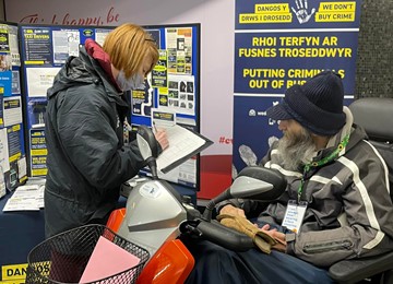 Gwent Police staff member marking a mobility scooter