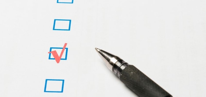 pen ticking a box