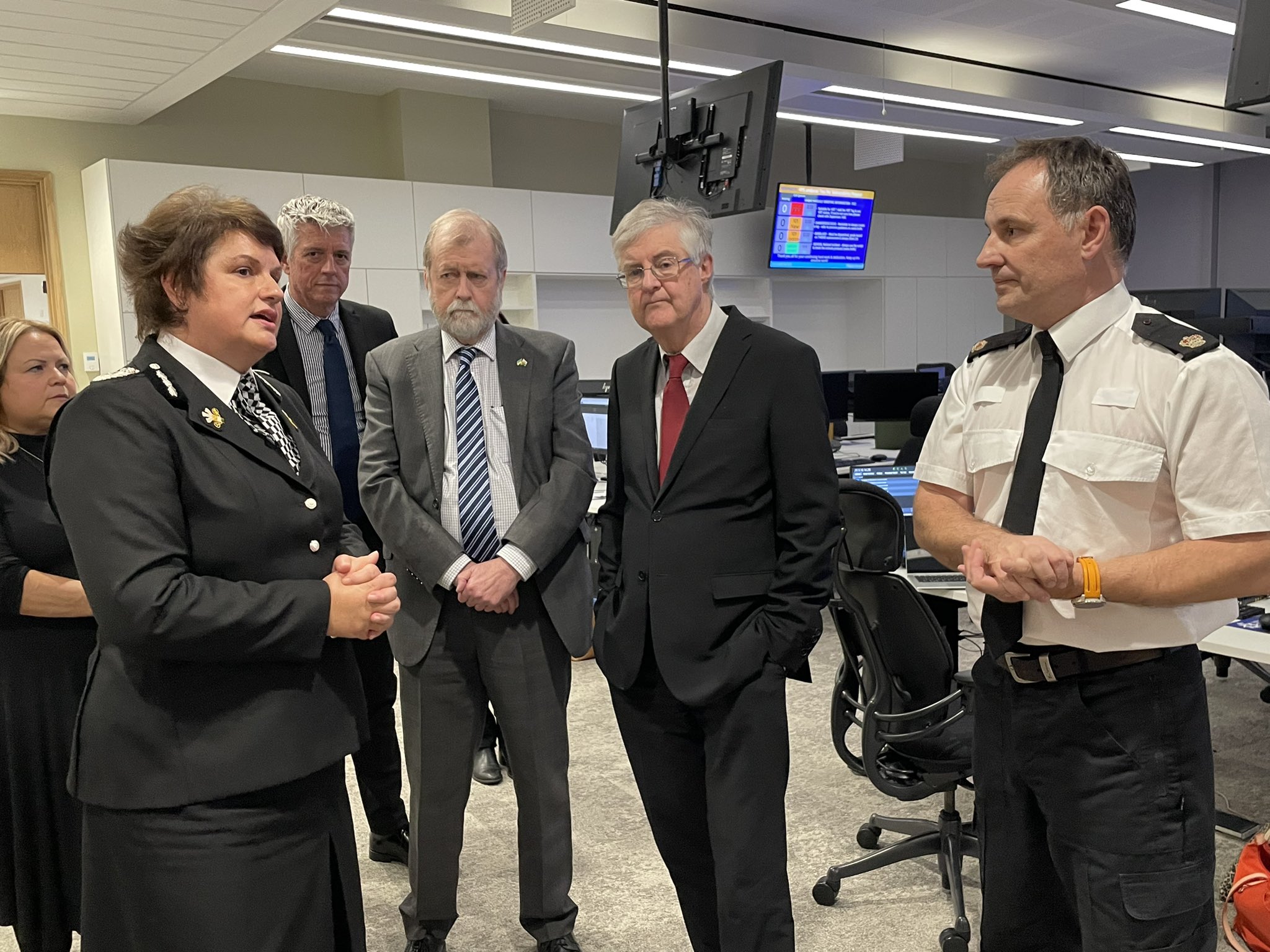 Commissioner, Chief Constable and First Minister talking to Gwent Police officers in control room